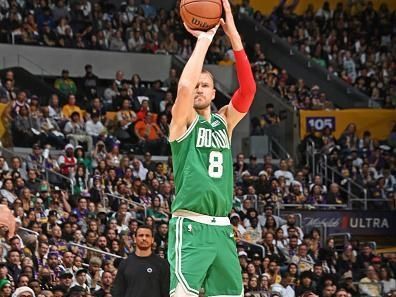 LOS ANGELES, CA - DECEMBER 25: Kristaps Porzingis #8 of the Boston Celtics shoots the ball during the game against the Los Angeles Lakers on December 25, 2023 at Crypto.Com Arena in Los Angeles, California. NOTE TO USER: User expressly acknowledges and agrees that, by downloading and/or using this Photograph, user is consenting to the terms and conditions of the Getty Images License Agreement. Mandatory Copyright Notice: Copyright 2023 NBAE (Photo by Andrew D. Bernstein/NBAE via Getty Images)