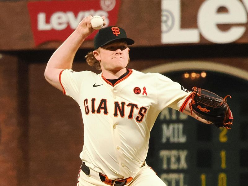 Jul 31, 2024; San Francisco, California, USA; San Francisco Giants starting pitcher Logan Webb (62) pitches against the Oakland Athletics during the ninth inning at Oracle Park. Mandatory Credit: Kelley L Cox-USA TODAY Sports