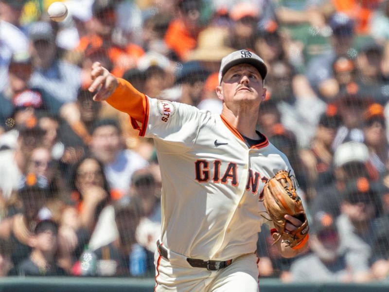 May 18, 2025; San Francisco, California, USA; San Francisco Giants third base Matt Chapman (26) gets an out at first during the sixth inning against the Oakland Athletics at Oracle Park. Mandatory Credit: Bob Kupbens-Imagn Images