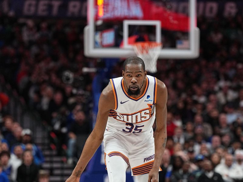 DALLAS, TX - JANUARY 24: Kevin Durant #35 of the Phoenix Suns handles the ball during the game against the Dallas Mavericks on January 24, 2024 at the American Airlines Center in Dallas, Texas. NOTE TO USER: User expressly acknowledges and agrees that, by downloading and or using this photograph, User is consenting to the terms and conditions of the Getty Images License Agreement. Mandatory Copyright Notice: Copyright 2024 NBAE (Photo by Glenn James/NBAE via Getty Images)