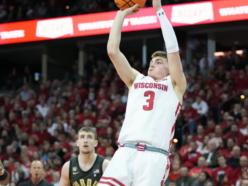 Mar 2, 2023; Madison, Wisconsin, USA;  Wisconsin Badgers guard Connor Essegian (3) shoots the ball during the second half against the Purdue Boilermakers at the Kohl Center. Mandatory Credit: Kayla Wolf-USA TODAY Sports