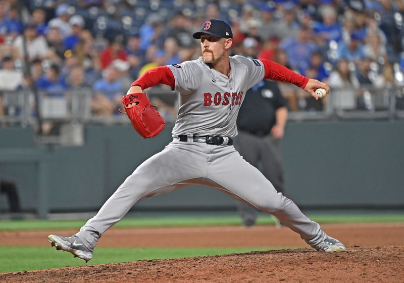 Aug 5, 2024; Kansas City, Missouri, USA;  Boston Red Sox relief pitcher Cam Booser (71) delivers a pitch in the ninth inning against the Kansas City Royals at Kauffman Stadium. Mandatory Credit: Peter Aiken-USA TODAY Sports