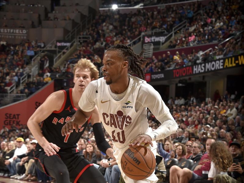 CLEVELAND, OH - NOVEMBER 24: Darius Garland #10 of the Cleveland Cavaliers drives to the basket during the game against the Toronto Raptors on November 24, 2024 at Rocket Mortgage FieldHouse in Cleveland, Ohio. NOTE TO USER: User expressly acknowledges and agrees that, by downloading and/or using this Photograph, user is consenting to the terms and conditions of the Getty Images License Agreement. Mandatory Copyright Notice: Copyright 2024 NBAE (Photo by David Liam Kyle/NBAE via Getty Images)