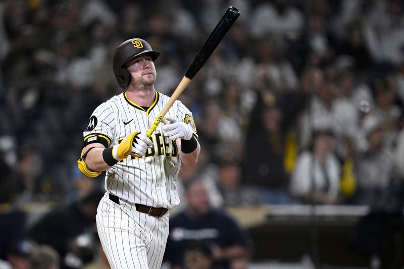 Jun 20, 2024; San Diego, California, USA; San Diego Padres second baseman Jake Cronenworth (9) hits a walk-off home run during the ninth inning against the Milwaukee Brewers at Petco Park. Mandatory Credit: Orlando Ramirez-USA TODAY Sports