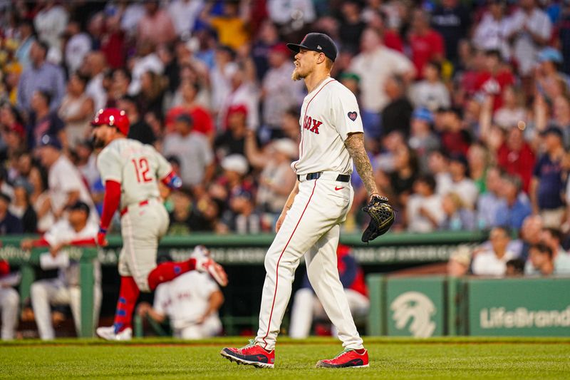 Jun 13, 2024; Boston, Massachusetts, USA; Philadelphia Phillies designated hitter Kyle Schwarber (12) hits a double to drive in three runs against Boston Red Sox starting pitcher Tanner Houck (89) in the fourth inning at Fenway Park. Mandatory Credit: David Butler II-USA TODAY Sports