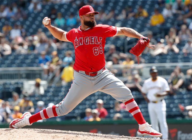 May 8, 2024; Pittsburgh, Pennsylvania, USA;  Los Angeles Angels relief pitcher Luis García (66) pitches against the Pittsburgh Pirates during the eighth inning at PNC Park.  Mandatory Credit: Charles LeClaire-USA TODAY Sports