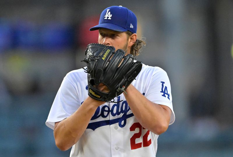 Aug 16, 2023; Los Angeles, California, USA;  Los Angeles Dodgers starting pitcher Clayton Kershaw (22) throws to the plate in the first inning against the Milwaukee Brewers at Dodger Stadium. Mandatory Credit: Jayne Kamin-Oncea-USA TODAY Sports