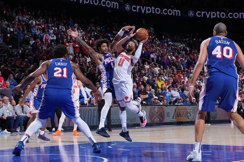 PHILADELPHIA, PA - APRIL 25: Jalen Brunson #11 of the New York Knicks drives to the basket during the game against the Philadelphia 76ers during Round 1 Game 3 of the 2024 NBA Playoffs on April 25, 2024 at the Wells Fargo Center in Philadelphia, Pennsylvania NOTE TO USER: User expressly acknowledges and agrees that, by downloading and/or using this Photograph, user is consenting to the terms and conditions of the Getty Images License Agreement. Mandatory Copyright Notice: Copyright 2024 NBAE (Photo by Jesse D. Garrabrant/NBAE via Getty Images)