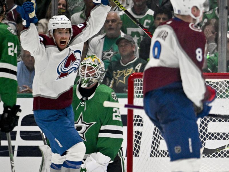 May 7, 2024; Dallas, Texas, USA; Colorado Avalanche left wing Artturi Lehkonen (62) celebrates a power play goal scored by defenseman Cale Makar (8) against Dallas Stars goaltender Jake Oettinger (29) during the second period in game one of the second round of the 2024 Stanley Cup Playoffs at American Airlines Center. Mandatory Credit: Jerome Miron-USA TODAY Sports