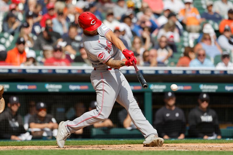 Sep 14, 2023; Detroit, Michigan, USA; Cincinnati Reds third baseman Nick Senzel (15) hits a single in the eighth inning against the Detroit Tigers at Comerica Park. Mandatory Credit: Rick Osentoski-USA TODAY Sports