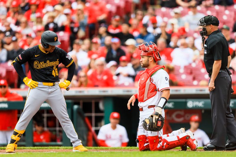 Apr 13, 2025; Cincinnati, Ohio, USA; Pittsburgh Pirates second baseman Enmanuel Valdez (48) reacts after striking out in the first inning against the Cincinnati Reds at Great American Ball Park. Mandatory Credit: Katie Stratman-Imagn Images