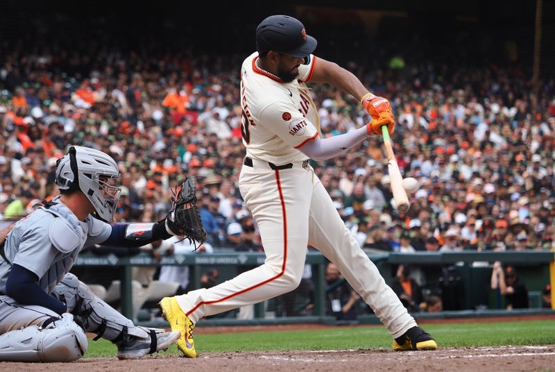 Aug 11, 2024; San Francisco, California, USA; San Francisco Giants designated hitter Jerar Encarnacion (59) hits an RBI double against the Detroit Tigers during the sixth inning at Oracle Park. Mandatory Credit: Kelley L Cox-USA TODAY Sports