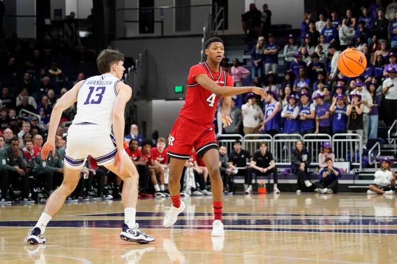 Jan 29, 2025; Evanston, Illinois, USA; Northwestern Wildcats guard Brooks Barnhizer (13) defends Rutgers Scarlet Knights guard Ace Bailey (4) during the first half at Welsh-Ryan Arena. Mandatory Credit: David Banks-Imagn Images