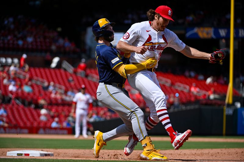 Aug 22, 2024; St. Louis, Missouri, USA;  St. Louis Cardinals starting pitcher Miles Mikolas (39) collides with Milwaukee Brewers center fielder Garrett Mitchell (5) as he forces him out at first during the sixth inning at Busch Stadium. Mandatory Credit: Jeff Curry-USA TODAY Sports