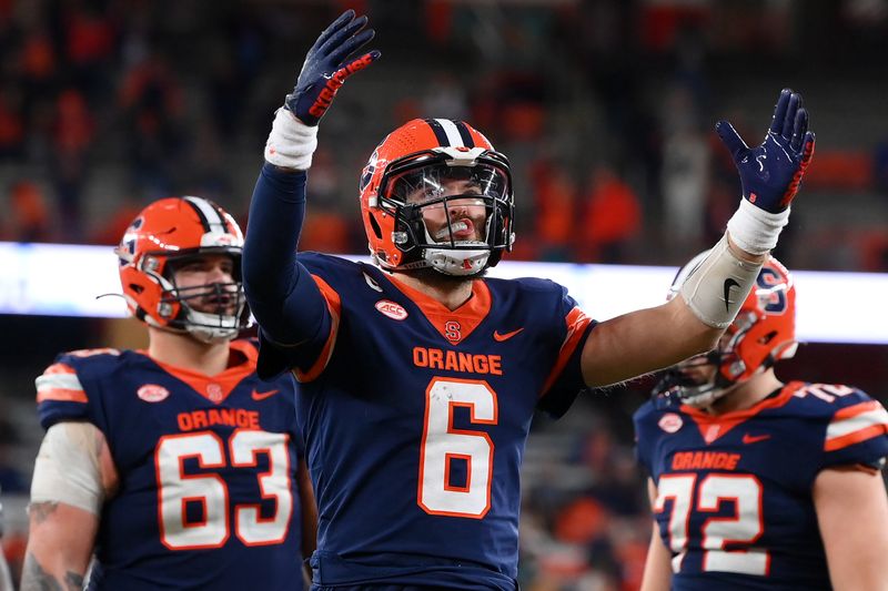 Nov 25, 2023; Syracuse, New York, USA; Syracuse Orange quarterback Garrett Schrader (6) gestures to the fans against the Wake Forest Demon Deacons during the second half at the JMA Wireless Dome. Mandatory Credit: Rich Barnes-USA TODAY Sports