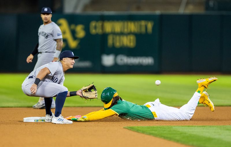 Sep 20, 2024; Oakland, California, USA; Oakland Athletics outfielder Lawrence Butler (4) steals second during the fourth inning against the New York Yankees at Oakland-Alameda County Coliseum. Mandatory Credit: Bob Kupbens-Imagn Images