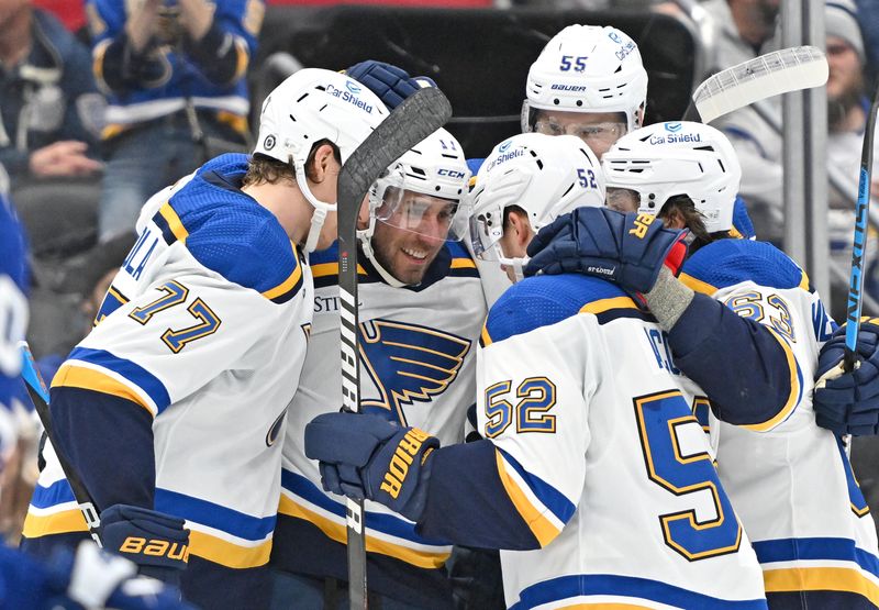 Jan 3, 2023; Toronto, Ontario, CAN; St. Louis Blues forward Josh Leivo (17) celebrates with teammates after scoring against the Toronto Maple Leafs in the second period at Scotiabank Arena. Mandatory Credit: Dan Hamilton-USA TODAY Sports