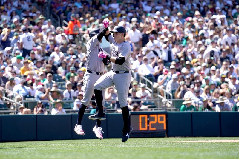 May 11, 2025; West Sacramento, California, USA; New York Yankees designated hitter Ben Rice (22) celebrates after hitting a grand slam against the Athletics in the fifth inning at Sutter Health Park. Mandatory Credit: Cary Edmondson-Imagn Images