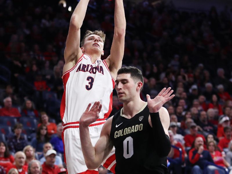 Feb 18, 2023; Tucson, Arizona, USA; Arizona Wildcats guard Pelle Larsson (3) shoots a basket against Colorado Buffaloes guard Luke O'Brien (0) during the second half at McKale Center. Mandatory Credit: Zachary BonDurant-USA TODAY Sports