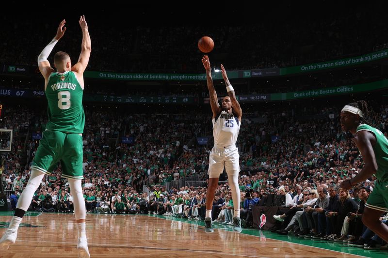 BOSTON, MA - JUNE 17: PJ Washington #25 of the Dallas Mavericks shoots a three point basket during the game  against the Boston Celtics during Game 5 of the 2024 NBA Finals on June 17, 2024 at the TD Garden in Boston, Massachusetts. NOTE TO USER: User expressly acknowledges and agrees that, by downloading and or using this photograph, User is consenting to the terms and conditions of the Getty Images License Agreement. Mandatory Copyright Notice: Copyright 2024 NBAE  (Photo by Nathaniel S. Butler/NBAE via Getty Images)