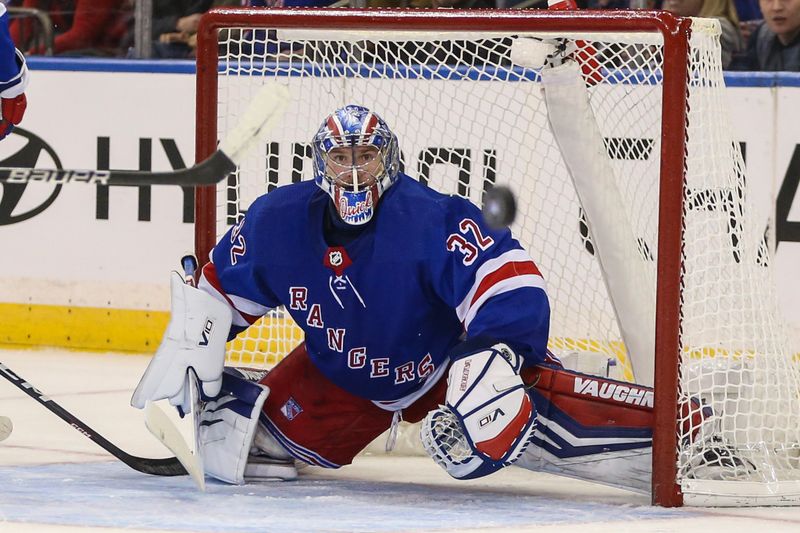 Nov 12, 2023; New York, New York, USA;  New York Rangers goaltender Jonathan Quick (32) watches the puck in the second period against the Columbus Blue Jackets at Madison Square Garden. Mandatory Credit: Wendell Cruz-USA TODAY Sports