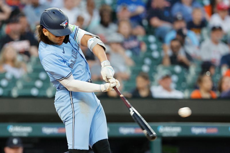 May 23, 2024; Detroit, Michigan, USA;  Toronto Blue Jays shortstop Bo Bichette (11) hits a RBI single in the eighth inning against the Detroit Tigers at Comerica Park. Mandatory Credit: Rick Osentoski-USA TODAY Sports