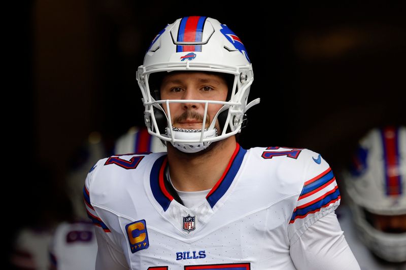 Buffalo Bills quarterback Josh Allen (17) takes the field before an NFL football game against the New England Patriots on Sunday, Oct. 22, 2023, in Foxborough, Mass. (AP Photo/Greg M. Cooper)