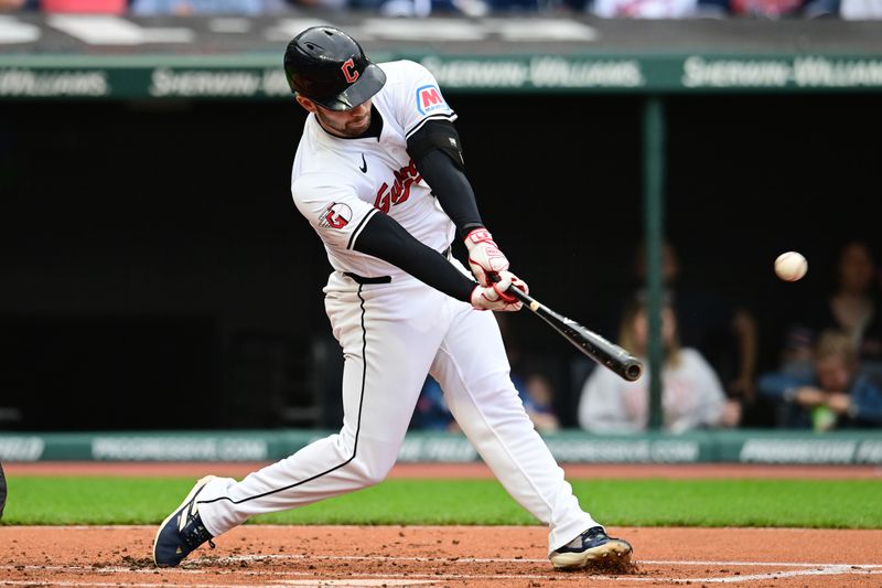 May 4, 2024; Cleveland, Ohio, USA; Cleveland Guardians first baseman David Fry (6) hits a single during the first inning against the Los Angeles Angels at Progressive Field. Mandatory Credit: Ken Blaze-USA TODAY Sports