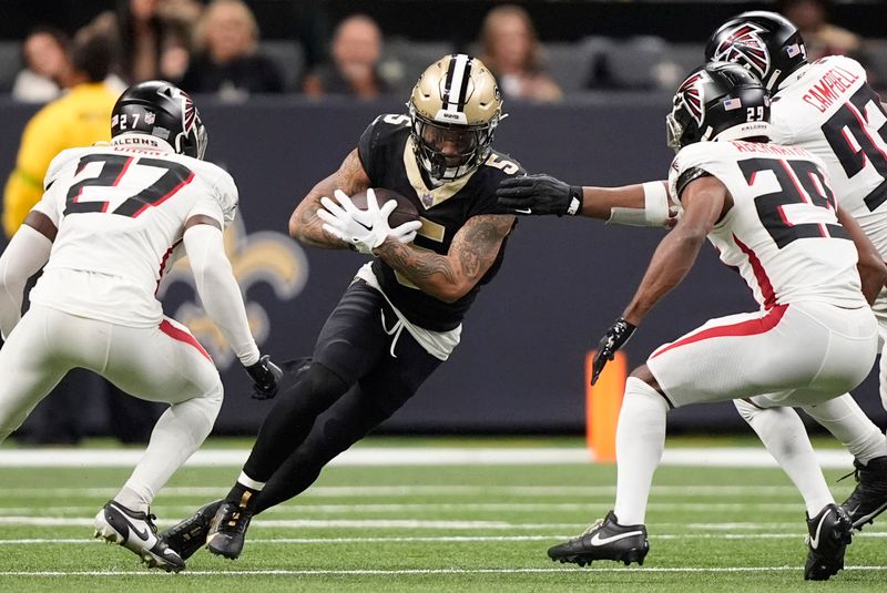 New Orleans Saints wide receiver Lynn Bowden Jr. (5) runs the ball in the second half of an NFL football game against the Atlanta Falcons in New Orleans, Sunday, Jan. 7, 2024. (AP Photo/Gerald Herbert)