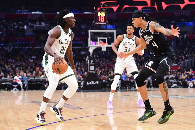 LOS ANGELES, CA - FEBRUARY 10: Jrue Holiday #21 of the Milwaukee Bucks drives to the basket during the game against the LA Clippers on February 10, 2023 at Crypto.Com Arena in Los Angeles, California. NOTE TO USER: User expressly acknowledges and agrees that, by downloading and/or using this Photograph, user is consenting to the terms and conditions of the Getty Images License Agreement. Mandatory Copyright Notice: Copyright 2023 NBAE (Photo by Adam Pantozzi/NBAE via Getty Images)