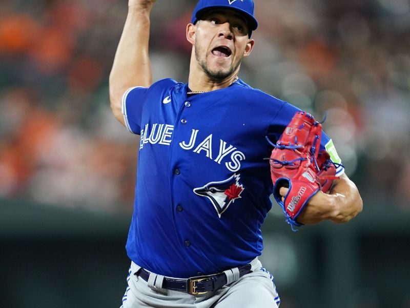 Aug 24, 2023; Baltimore, Maryland, USA; Toronto Blue Jays  pitcher Jose Berrios (17) delivers in them first inning against the Baltimore Orioles at Oriole Park at Camden Yards. Mandatory Credit: Mitch Stringer-USA TODAY Sports