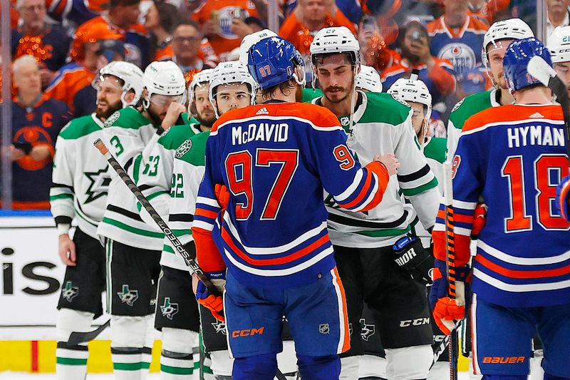 Jun 2, 2024; Edmonton, Alberta, CAN; Edmonton Oilers forward Connor McDavid (97) shakes hands with Dallas Stars forward Mason Marchment (27) after winning the Western Conference Championship in game six of the Western Conference Final of the 2024 Stanley Cup Playoffs at Rogers Place. Mandatory Credit: Perry Nelson-USA TODAY Sports