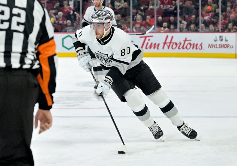 Dec 7, 2023; Montreal, Quebec, CAN; Los Angeles Kings forward Pierre-Luc Dubois (80) plays the puck during the third period of the game against the Montreal Canadiens at the Bell Centre. Mandatory Credit: Eric Bolte-USA TODAY Sports