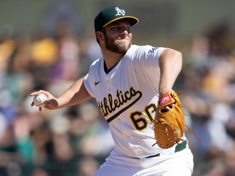 May 7, 2025; West Sacramento, California, USA; Athletics pitcher Justin Sterner (60) delivers a pitch against the Seattle Mariners during the eighth inning at Sutter Health Park. Mandatory Credit: D. Ross Cameron-Imagn Images