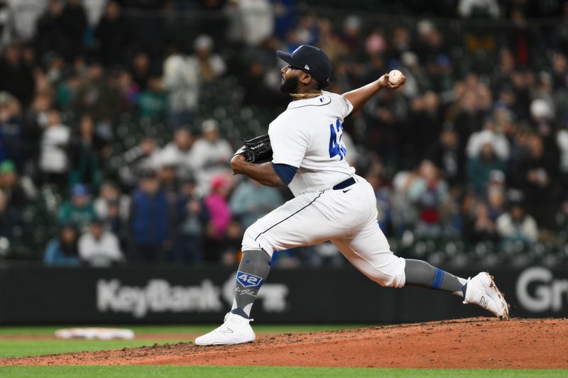 Apr 15, 2023; Seattle, Washington, USA; Seattle Mariners relief pitcher Diego Castillo pitches to the Colorado Rockies during the ninth inning at T-Mobile Park. Mandatory Credit: Steven Bisig-USA TODAY Sports