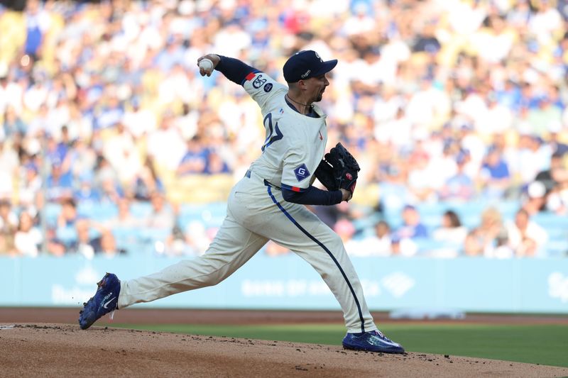 Aug 9, 2025; Los Angeles, California, USA; Los Angeles Dodgers pitcher Blake Snell (7) throws pitch against the Toronto Blue Jays during the first inning at Dodger Stadium. Mandatory Credit: Kiyoshi Mio-Imagn Images