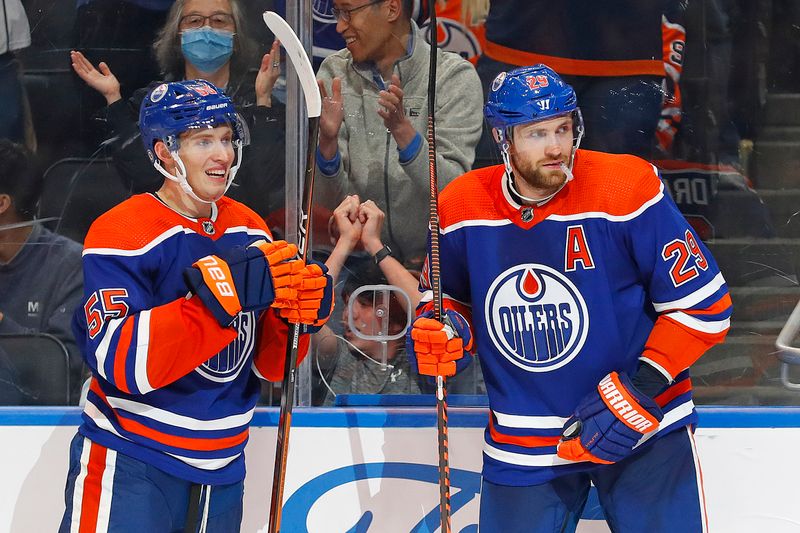 Oct 7, 2022; Edmonton, Alberta, CAN; Edmonton Oilers forward Leon Draisaitl (29) celebrates after scoring a goal against the Seattle Kraken during the third period at Rogers Place. Mandatory Credit: Perry Nelson-USA TODAY Sports