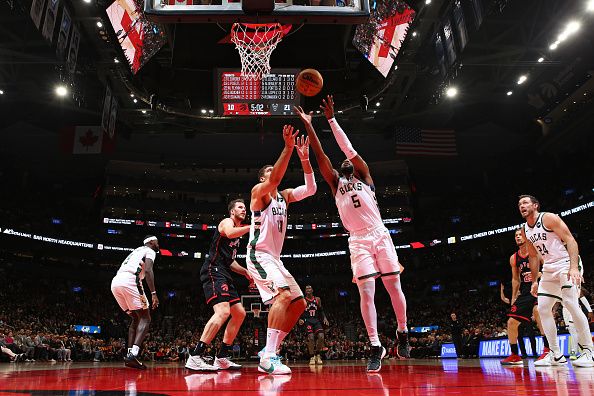 TORONTO, CANADA - NOVEMBER 15:  Malik Beasley #5 of the Milwaukee Bucks grabs a rebound during the game against the Toronto Raptors on November 15, 2023 at the Scotiabank Arena in Toronto, Ontario, Canada.  NOTE TO USER: User expressly acknowledges and agrees that, by downloading and or using this Photograph, user is consenting to the terms and conditions of the Getty Images License Agreement.  Mandatory Copyright Notice: Copyright 2023 NBAE (Photo by Vaughn Ridley/NBAE via Getty Images)