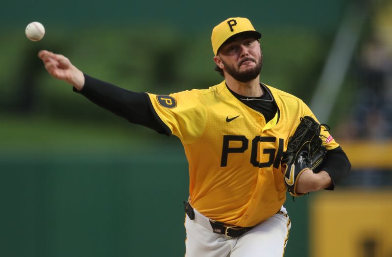 May 23, 2025; Pittsburgh, Pennsylvania, USA;  Pittsburgh Pirates starting pitcher Paul Skenes (30) pitches against the Milwaukee Brewers during the second inning at PNC Park. Mandatory Credit: Charles LeClaire-Imagn Images