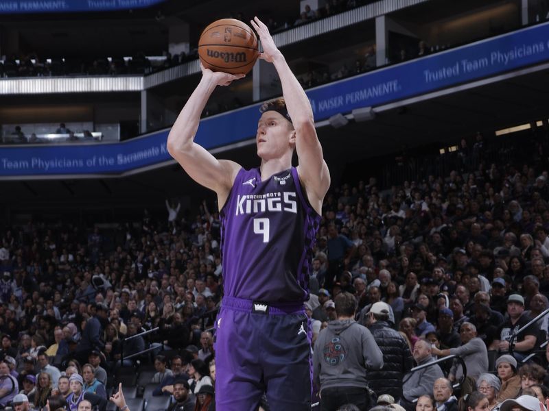 SACRAMENTO, CA - MARCH 12: Kevin Huerter #9 of the Sacramento Kings shoots a three point basket against the Milwaukee Bucks on March 12, 2024 at Golden 1 Center in Sacramento, California. NOTE TO USER: User expressly acknowledges and agrees that, by downloading and or using this Photograph, user is consenting to the terms and conditions of the Getty Images License Agreement. Mandatory Copyright Notice: Copyright 2024 NBAE (Photo by Rocky Widner/NBAE via Getty Images)