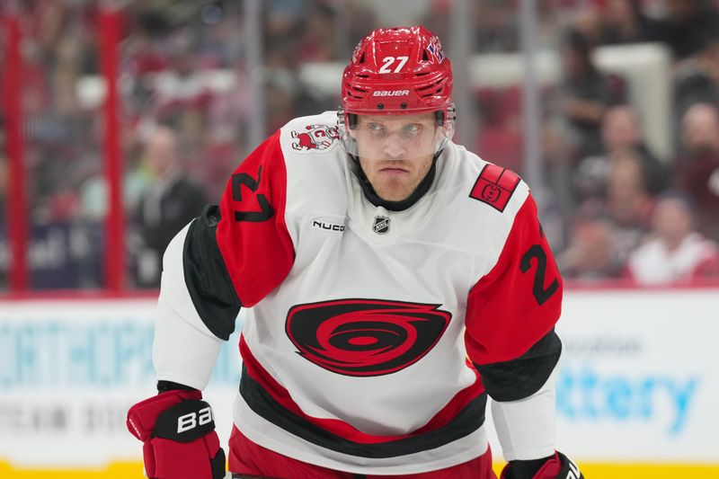 Sep 24, 2025; Raleigh, North Carolina, USA;  Carolina Hurricanes left wing Nikolaj Ehlers (27) looks on against the Florida Panthers during the third period at Lenovo Center. Mandatory Credit: James Guillory-Imagn Images
