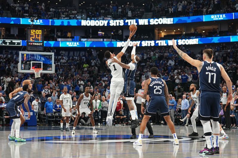 DALLAS, TX - OCTOBER 24: Victor Wembanyama #1 of the San Antonio Spurs wins the jump ball during the game against the Dallas Mavericks on October 24, 2024 at the American Airlines Center in Dallas, Texas. NOTE TO USER: User expressly acknowledges and agrees that, by downloading and or using this photograph, User is consenting to the terms and conditions of the Getty Images License Agreement. Mandatory Copyright Notice: Copyright 2024 NBAE (Photo by Glenn James/NBAE via Getty Images)