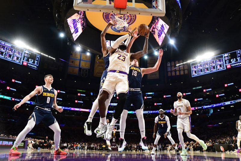 LOS ANGELES, CA - APRIL 27: LeBron James #23 of the Los Angeles Lakers drives to the basket during the game against the Denver Nuggets during Round 1 Game 4 of the 2024 NBA Playoffs on April 27, 2024 at Crypto.Com Arena in Los Angeles, California. NOTE TO USER: User expressly acknowledges and agrees that, by downloading and/or using this Photograph, user is consenting to the terms and conditions of the Getty Images License Agreement. Mandatory Copyright Notice: Copyright 2024 NBAE (Photo by Adam Pantozzi/NBAE via Getty Images)