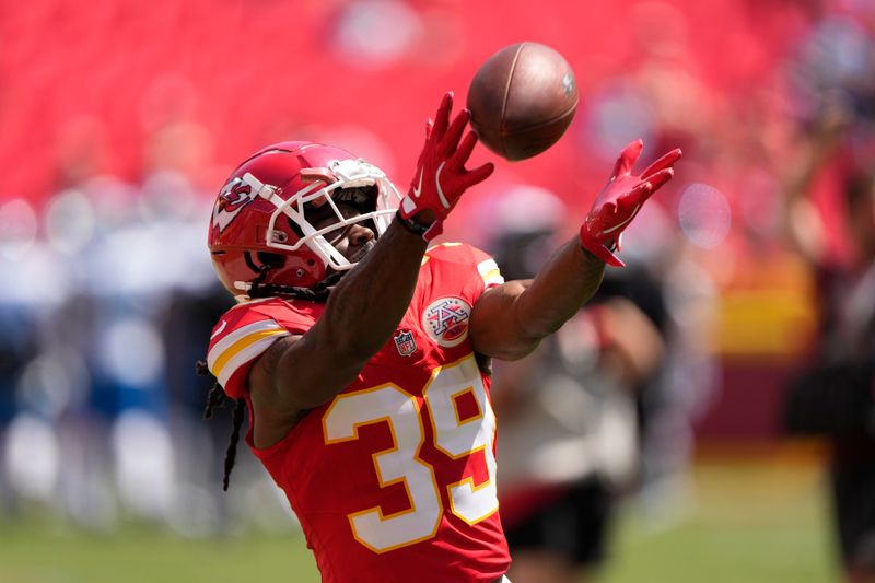 Kansas City Chiefs running back Emani Bailey (39) warms up before an NFL preseason football game against the Detroit Lions Saturday, Aug. 17, 2024, in Kansas City, Mo. (AP Photo/Charlie Riedel)