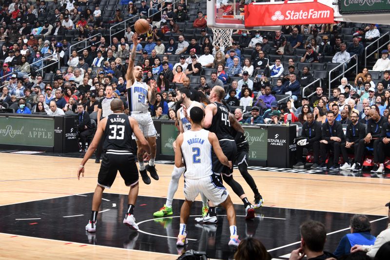 LOS ANGELES, CA - MARCH 18: Cole Anthony #50 of the Orlando Magic drives to the basket during the game against the LA Clippers on March 18, 2023 at Crypto.Com Arena in Los Angeles, California. NOTE TO USER: User expressly acknowledges and agrees that, by downloading and/or using this Photograph, user is consenting to the terms and conditions of the Getty Images License Agreement. Mandatory Copyright Notice: Copyright 2023 NBAE (Photo by Adam Pantozzi/NBAE via Getty Images)