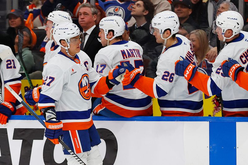 Nov 12, 2024; Edmonton, Alberta, CAN; The New York Islanders celebrate a goal scored by forward Anders Lee (27) during the third period against the Edmonton Oilers at Rogers Place. Mandatory Credit: Perry Nelson-Imagn Images