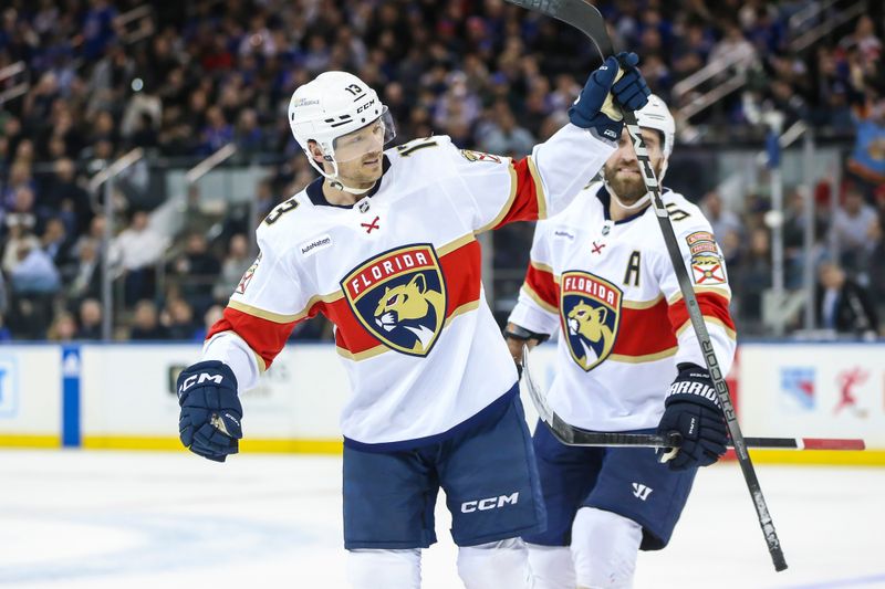 Mar 4, 2024; New York, New York, USA;  Florida Panthers center Sam Reinhart (13) celebrates after scoring a goal in the second period against the New York Rangers at Madison Square Garden. Mandatory Credit: Wendell Cruz-USA TODAY Sports