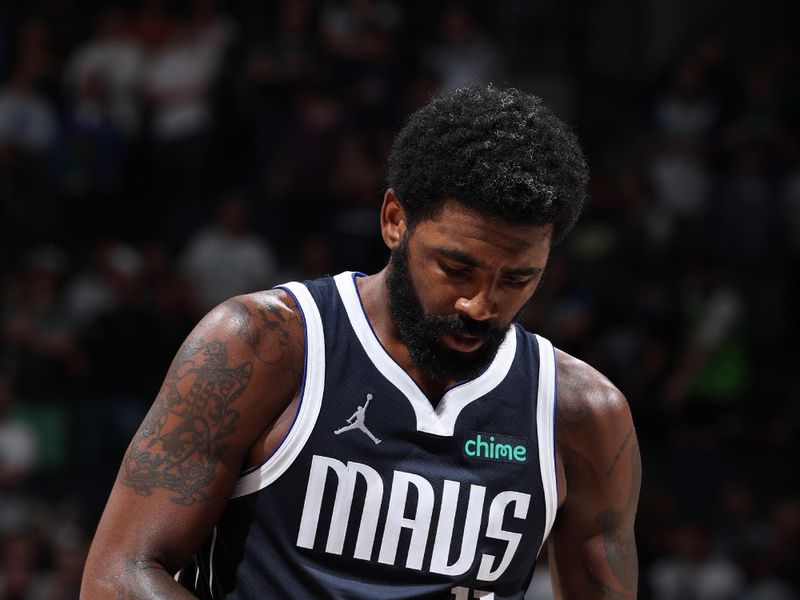 MINNEAPOLIS, MN -  OCTOBER 29: Kyrie Irving #11 of the Dallas Mavericks shoots a free throw during the game against the Minnesota Timberwolves on October 29, 2024 at Target Center in Minneapolis, Minnesota. NOTE TO USER: User expressly acknowledges and agrees that, by downloading and or using this Photograph, user is consenting to the terms and conditions of the Getty Images License Agreement. Mandatory Copyright Notice: Copyright 2024 NBAE (Photo by David Sherman/NBAE via Getty Images)