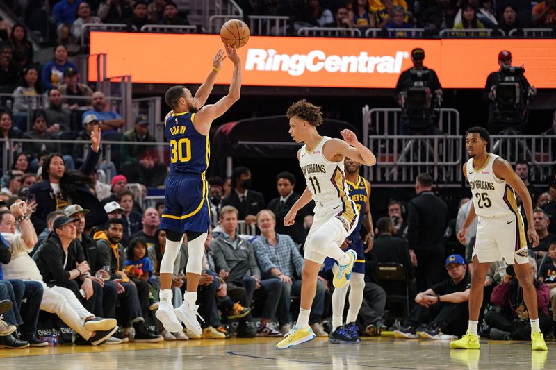 SAN FRANCISCO, CA - APRIL 12: Stephen Curry #30 of the Golden State Warriors attempts a three-point jump shot in the fourth quarter against Dyson Daniels #11 of the New Orleans Pelicans at Chase Center on April 12, 2024 in San Francisco, California. NOTE TO USER: User expressly acknowledges and agrees that, by downloading and/or using this photograph, User is consenting to the terms and conditions of the Getty Images License Agreement. (Photo by Kavin Mistry/Getty Images)