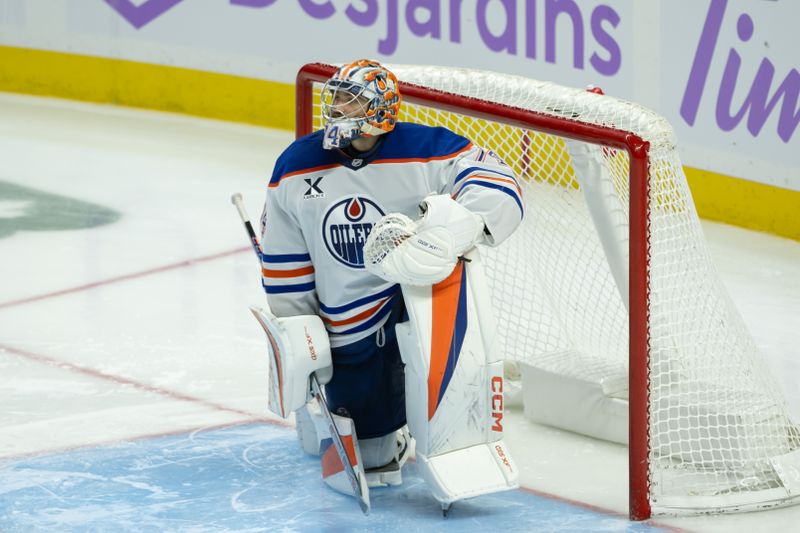 Nov 19, 2024; Ottawa, Ontario, CAN; Edmonton Oilers goalie Stuart Skinner (74) stretches prior to the start of the third period against the  Ottawa Senators at the Canadian Tire Centre. Mandatory Credit: Marc DesRosiers-Imagn Images